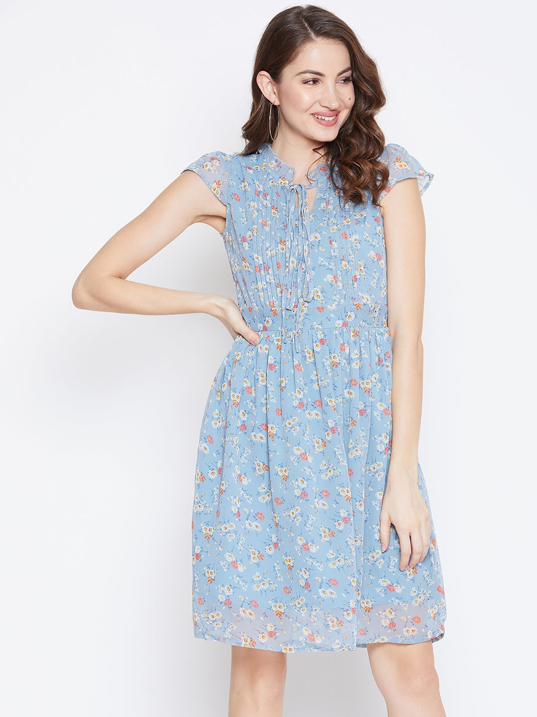 Berrylush Women Blue Floral Printed Tie-Up Neck Pleated Fit & Flare Mi