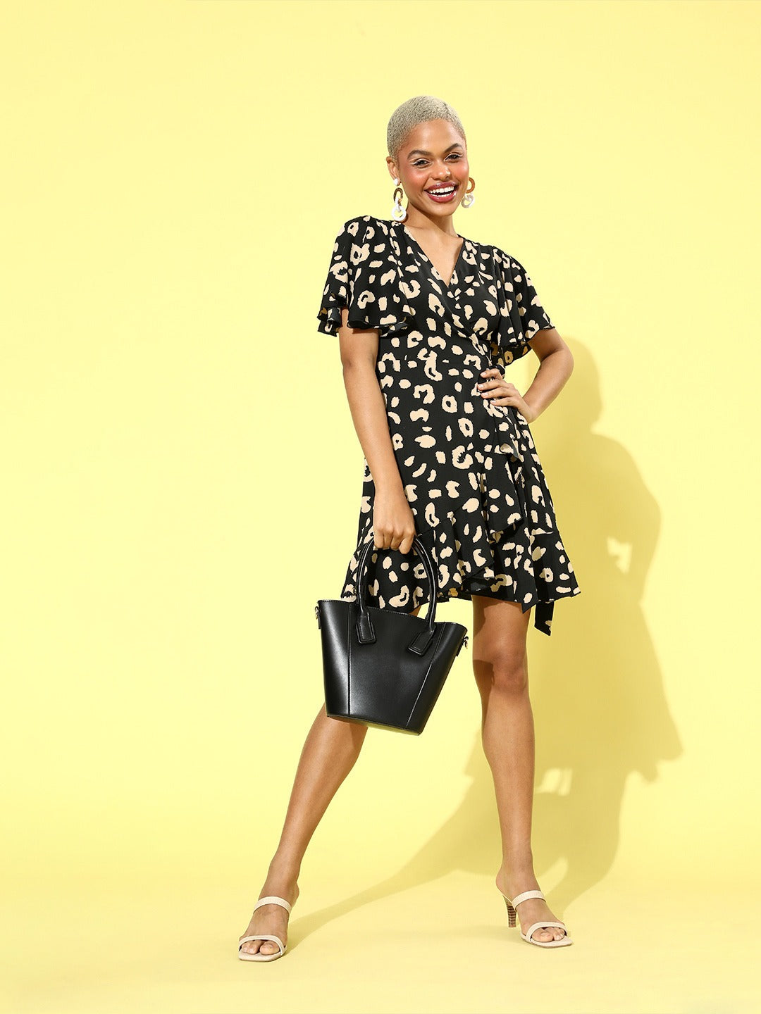 Berrylush Women Black Yellow Leopard Printed Self-Tie Mini Wrap Dres