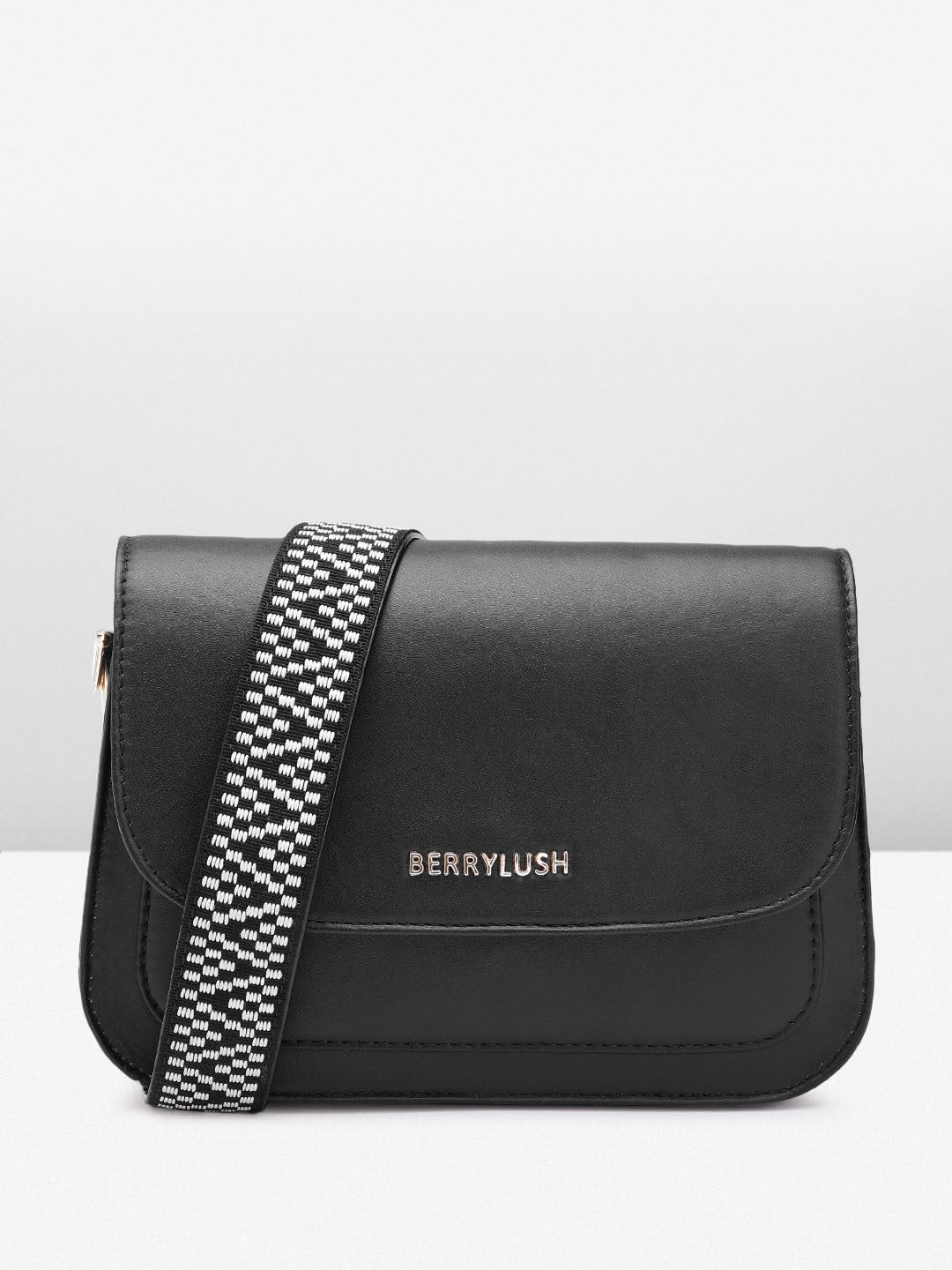 Stylish black women's sling bag by Berrylush with sleek design