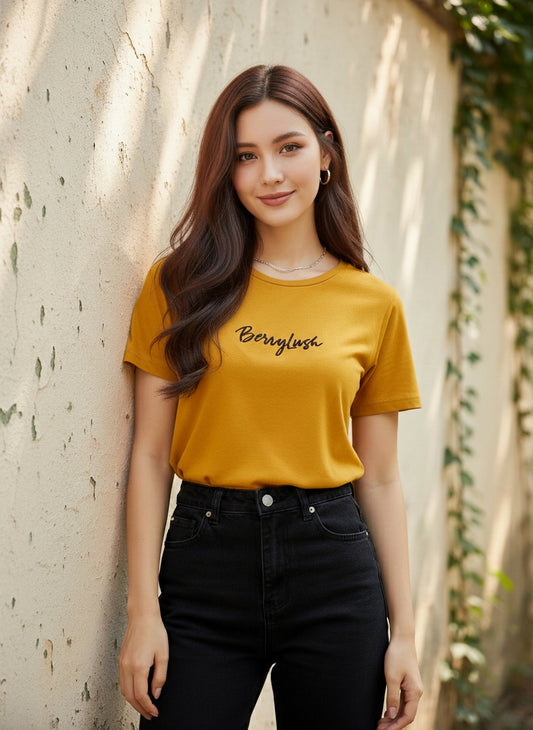 Berrylush Women Solid Mustard Yellow Round Neck Front Brand Logo Short Sleeves Knitted Regular T-Shirt