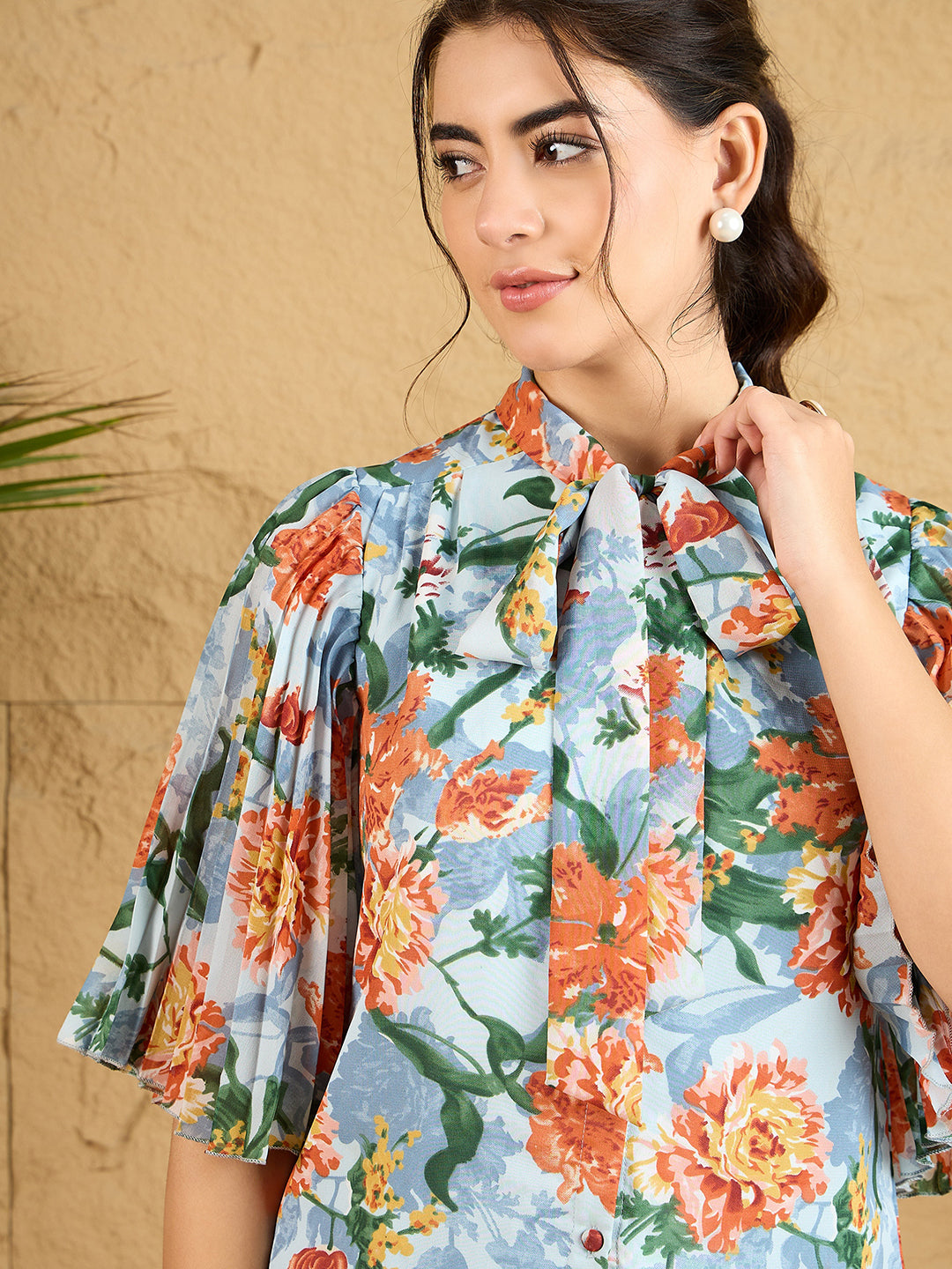 Berrylush Women Blue & Orange Floral Printed Tie-Up Neck Pleated Sleeves Button-Up Regular Top