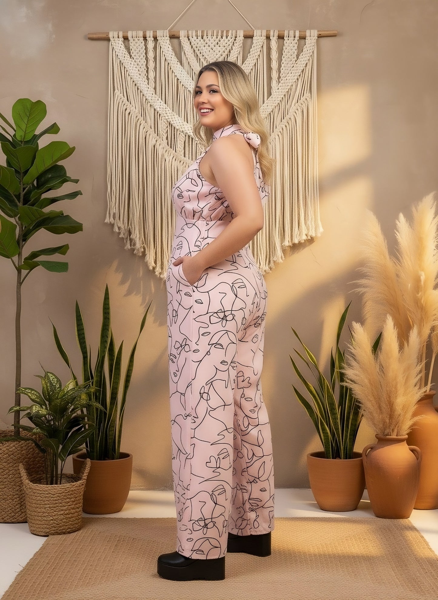 Berrylush Curve Women Pink & Black Abstract Print Halter Neck Sleeveless Backless Slant Pockets Wide-Leg Maxi Jumpsuit