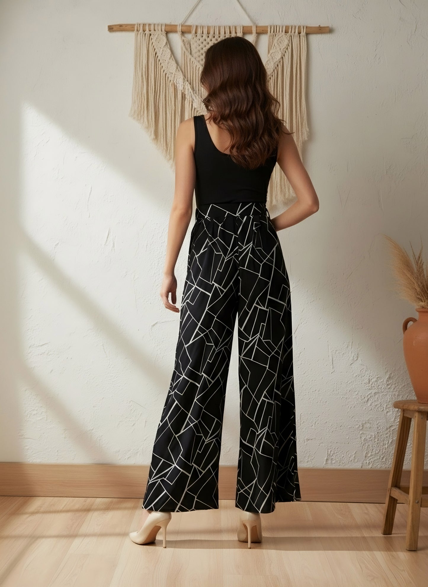 Berrylush Women Black & White Geometric Printed Round Neck Sleeveless Waist Tie-Up Wide Leg Regular Jumpsuit
