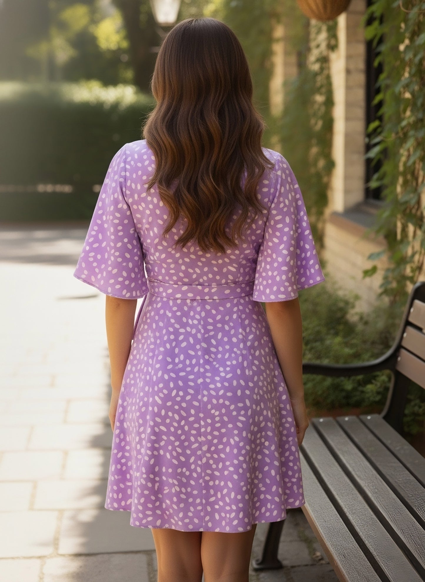 Berrylush Women Purple & White Abstract Printed V-Neck Flutter Sleeves Tie-Up Waist Curved Hem Fit & Flare Mini Jumpsuit