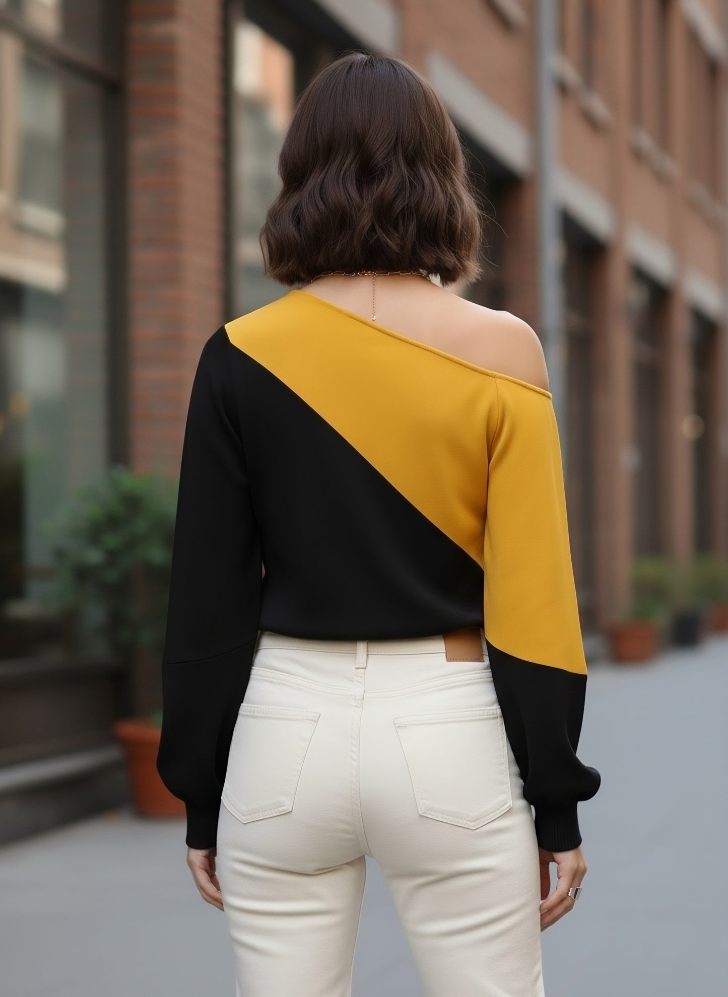 Berrylush Women Black & Mustard Yellow Colour-Blocked Pattern Round Neck Bishop Sleeves Regular Blouson Top