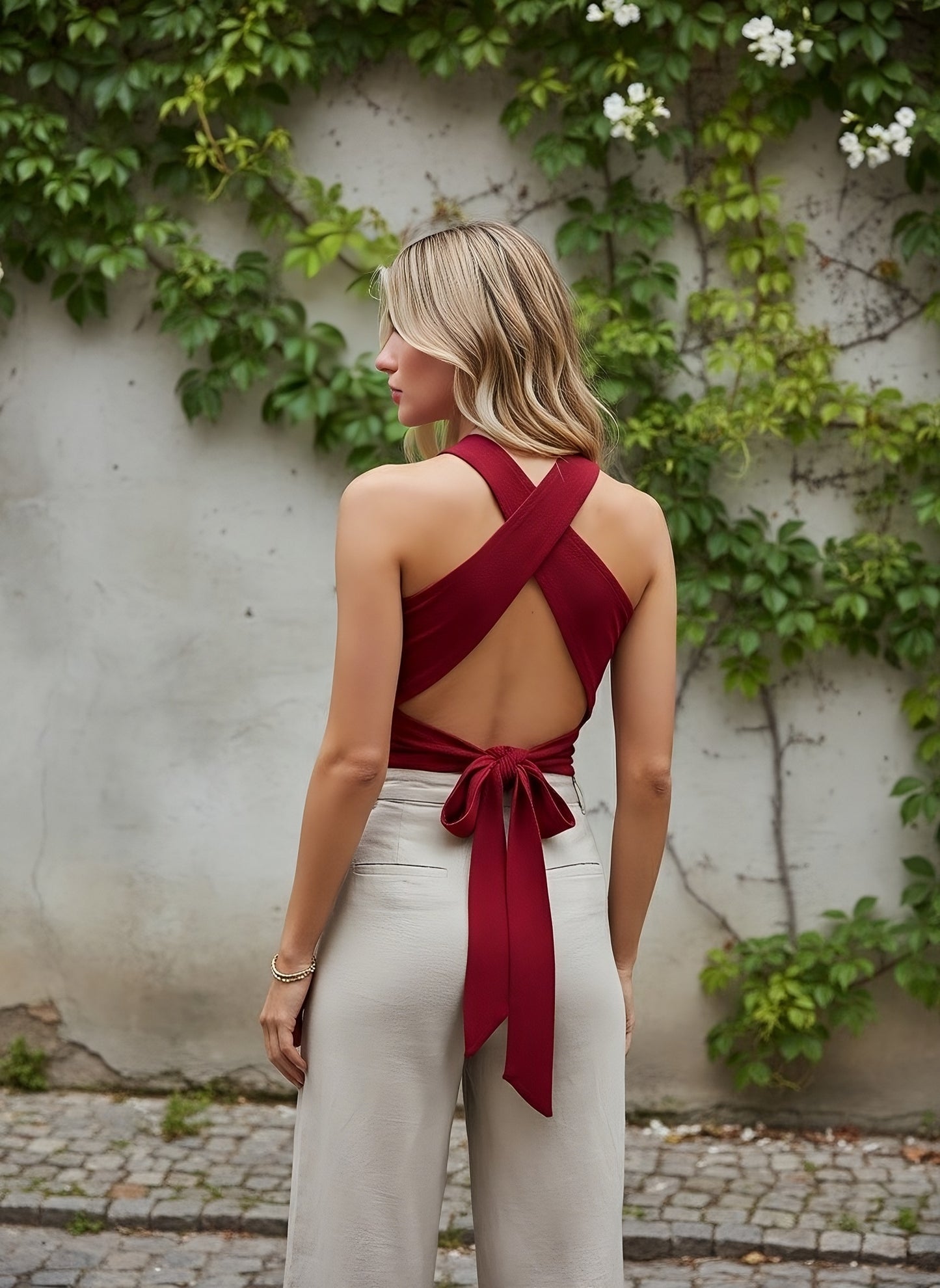 Berrylush Women Solid Red Halter Neck Sleeveless Crisscross Tie-Up Back Knitted Regular Top