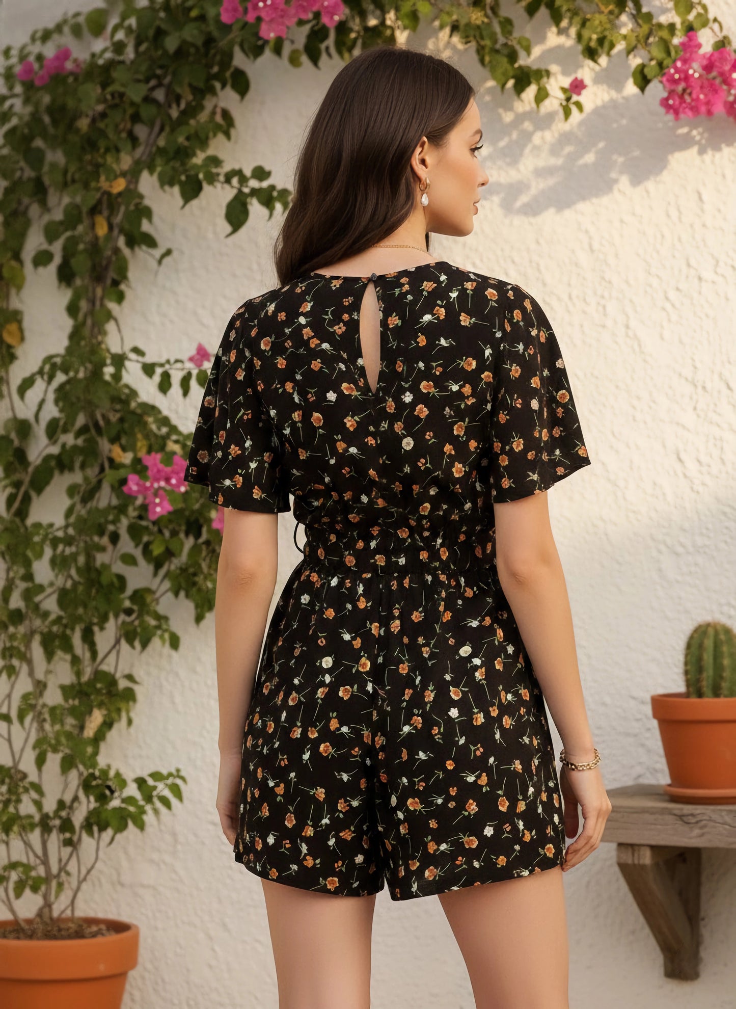 Berrylush Women Black & Orange Floral Printed V-Neck Back Keyhole Waist Tie-Up Mini Romper Jumpsuit