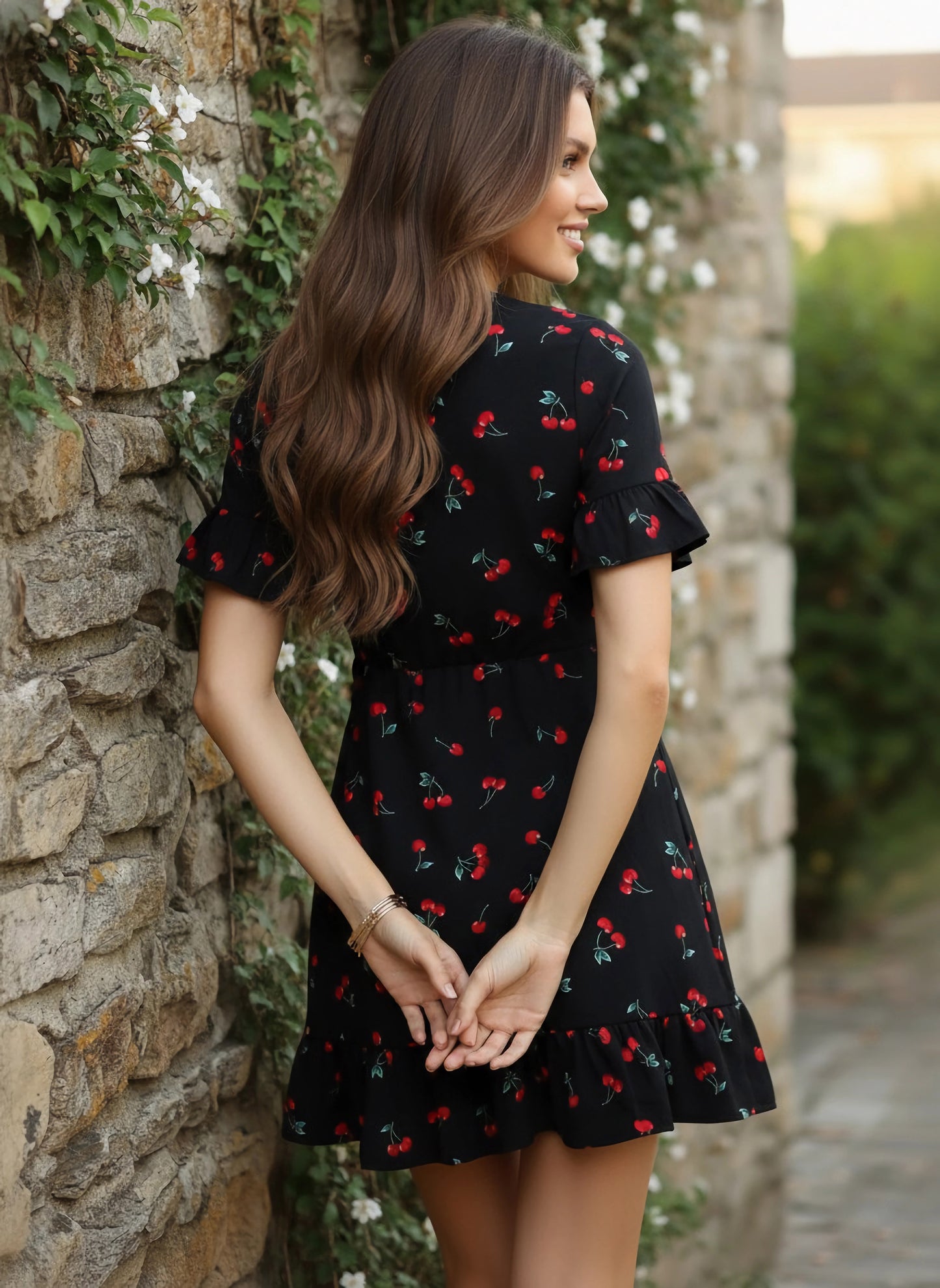 Berrylush Women Black & Red Cherry Printed V-Neck Waist Tie-Up Flounce Hem Fit & Flare Wrap Mini Dress