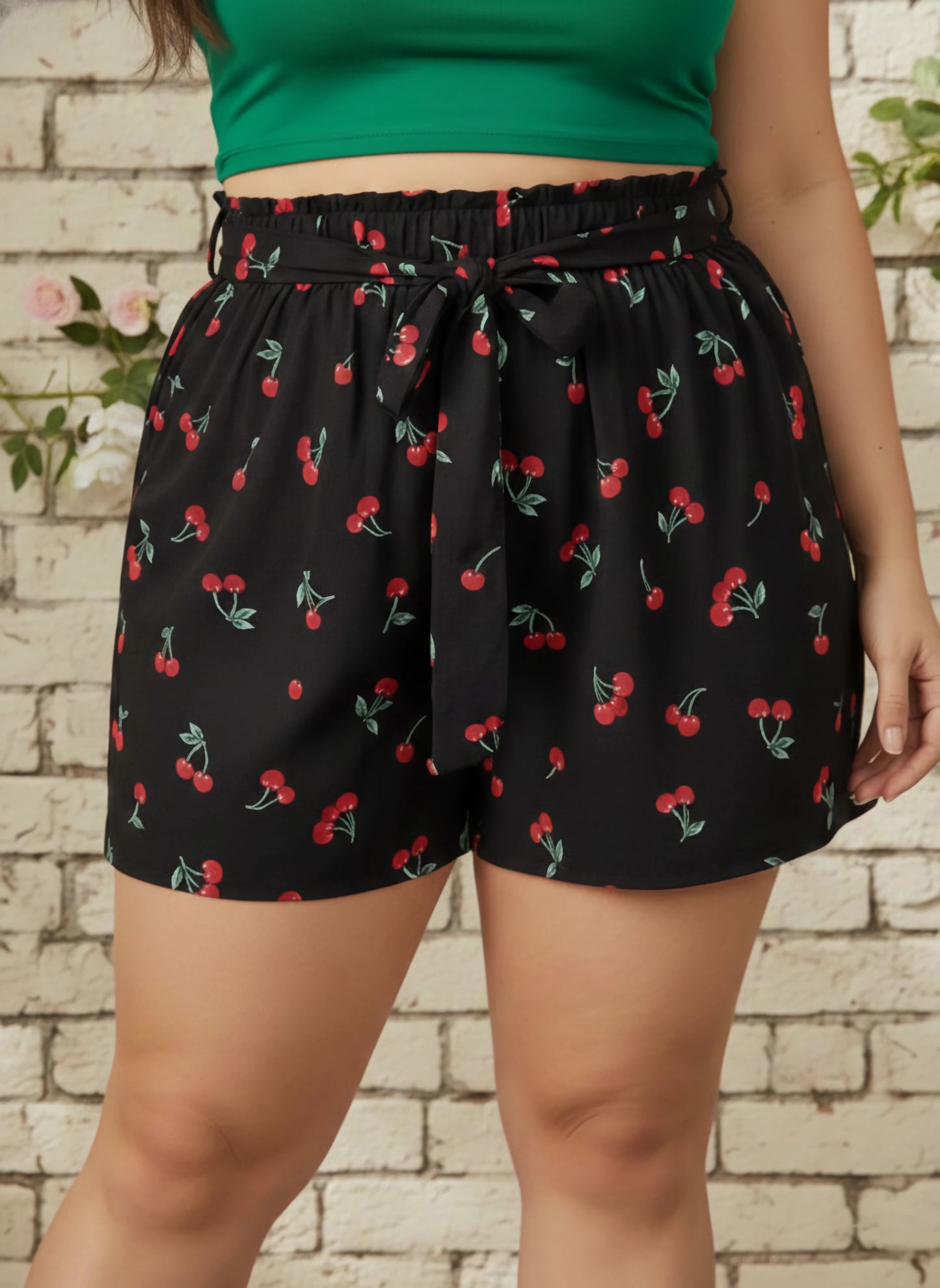 Berrylush Women Plus Size Black & Red Cherry Printed Front Tie-Up High-Rise Paperbag Waist Crepe Pleated Mini Shorts