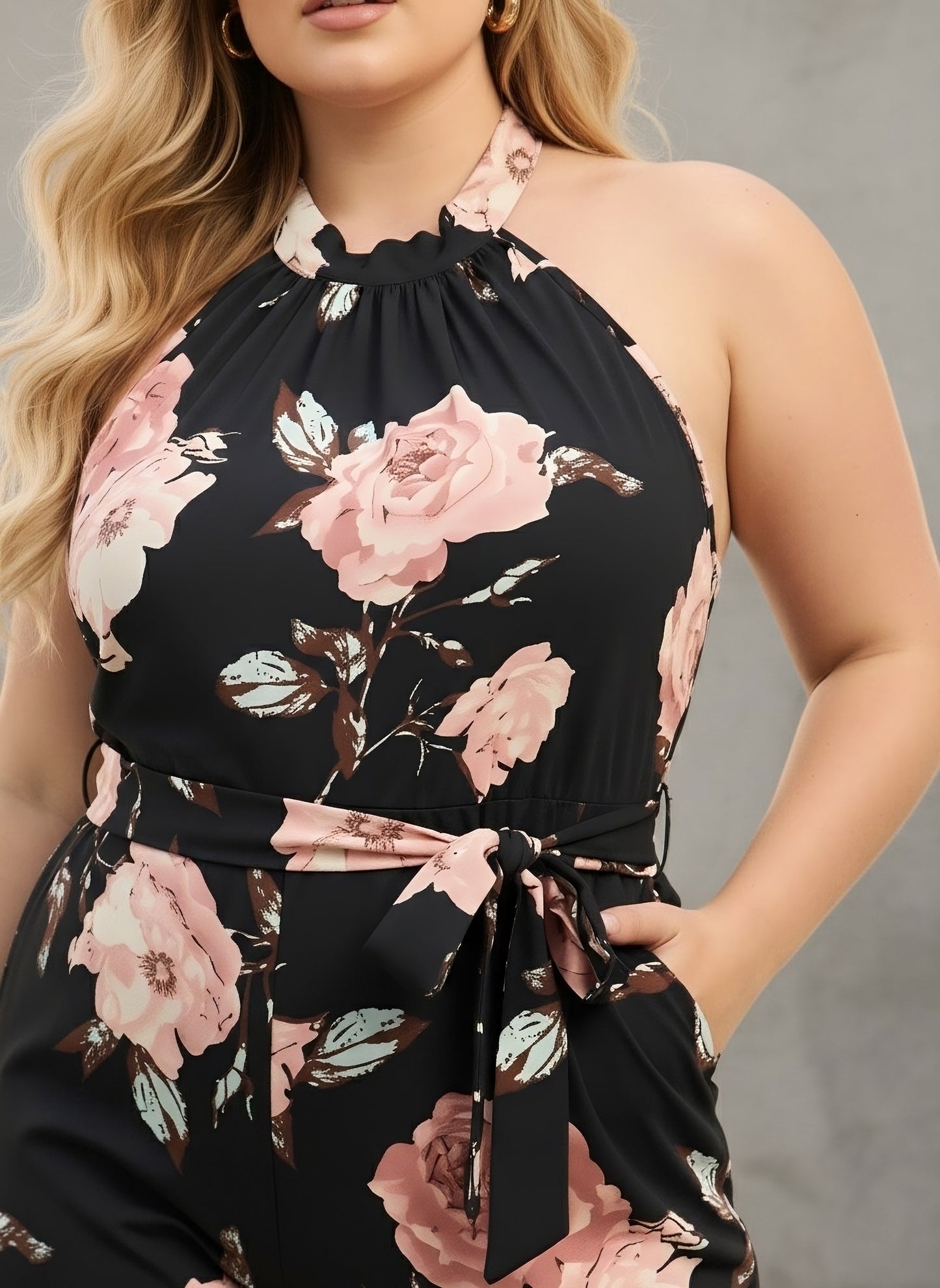 Berrylush Curve Women Black & Pink Floral Printed Halter Neck Sleeveless Waist Tie-Up Backless Pleated Mini Jumpsuit