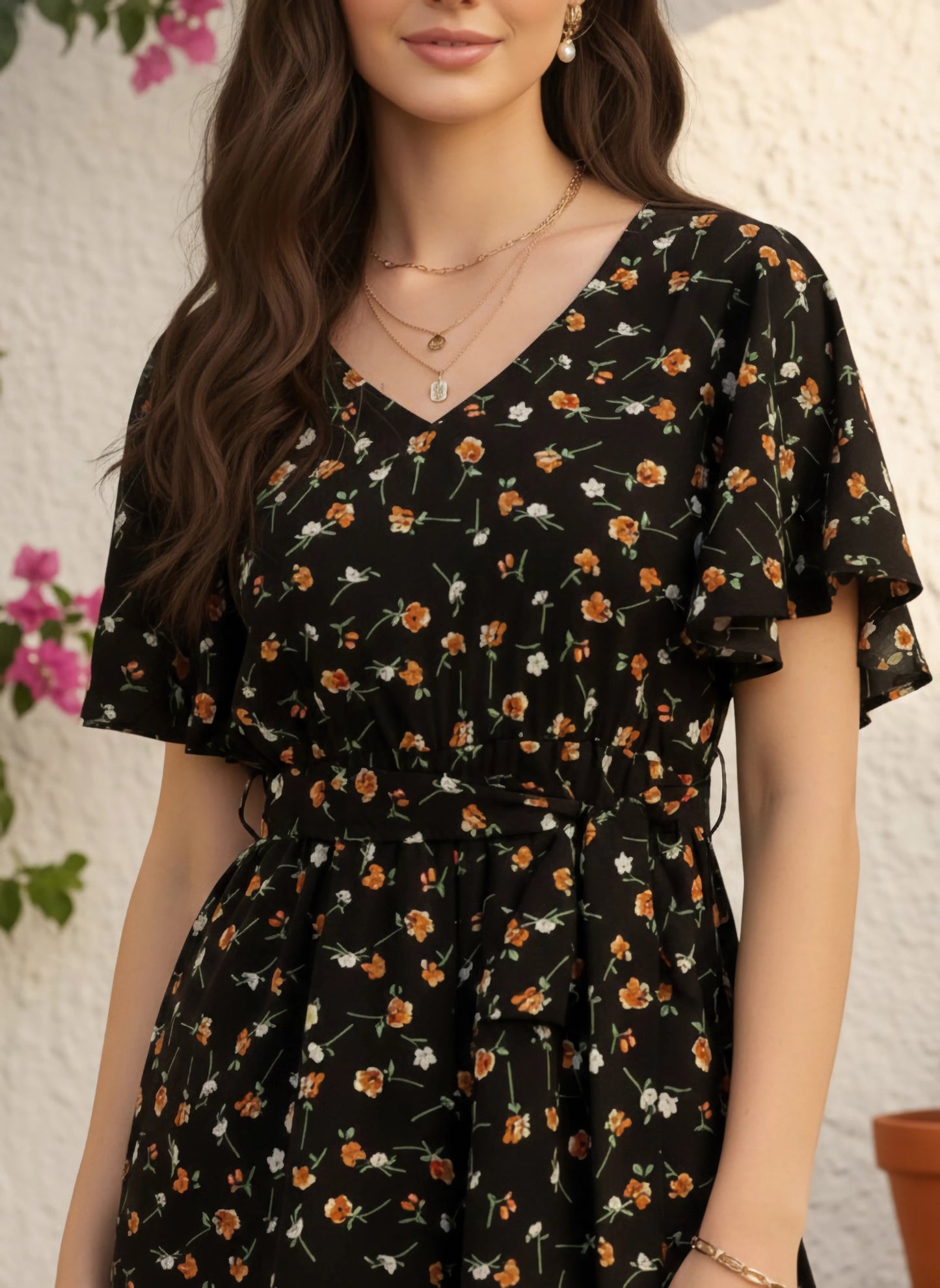 Berrylush Women Black & Orange Floral Printed V-Neck Back Keyhole Waist Tie-Up Mini Romper Jumpsuit