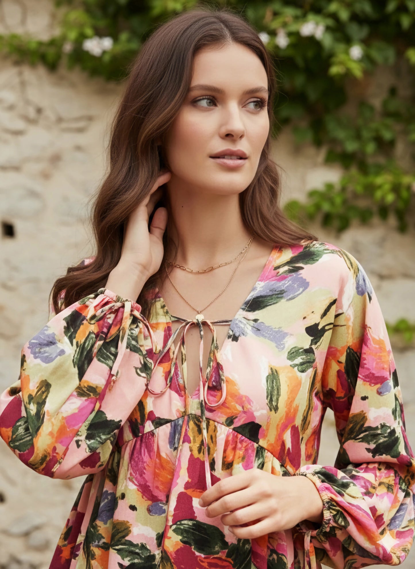 Berrylush Women Pink & Multicolour Abstract Printed V-Neck Bishop Sleeves Front Tie-Up Ruffled Regular Peplum Top