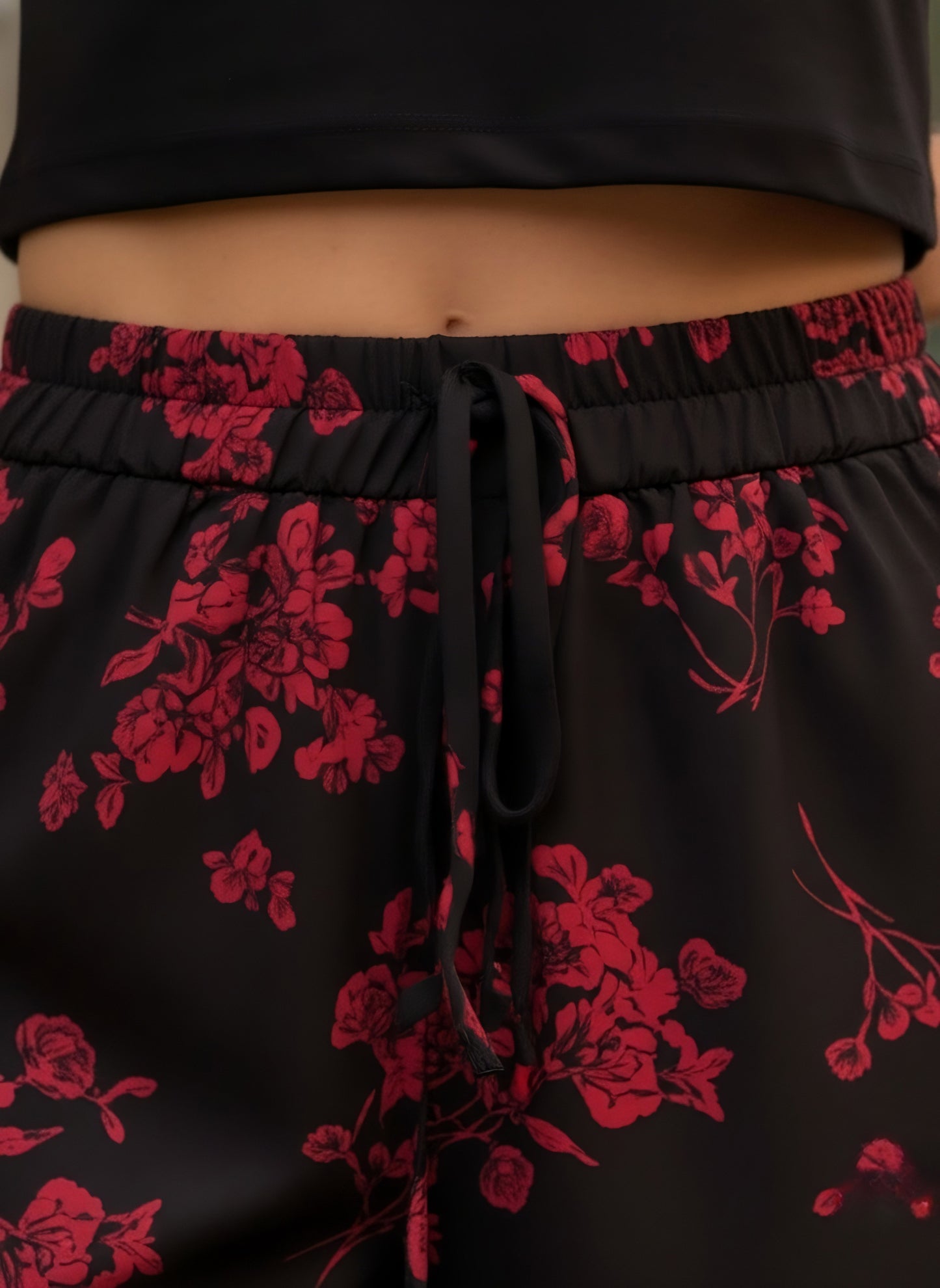 Berrylush Women Black & Red Floral Printed High-Rise Elastic Waist Tie-Up Slip-On Mini Summer Shorts
