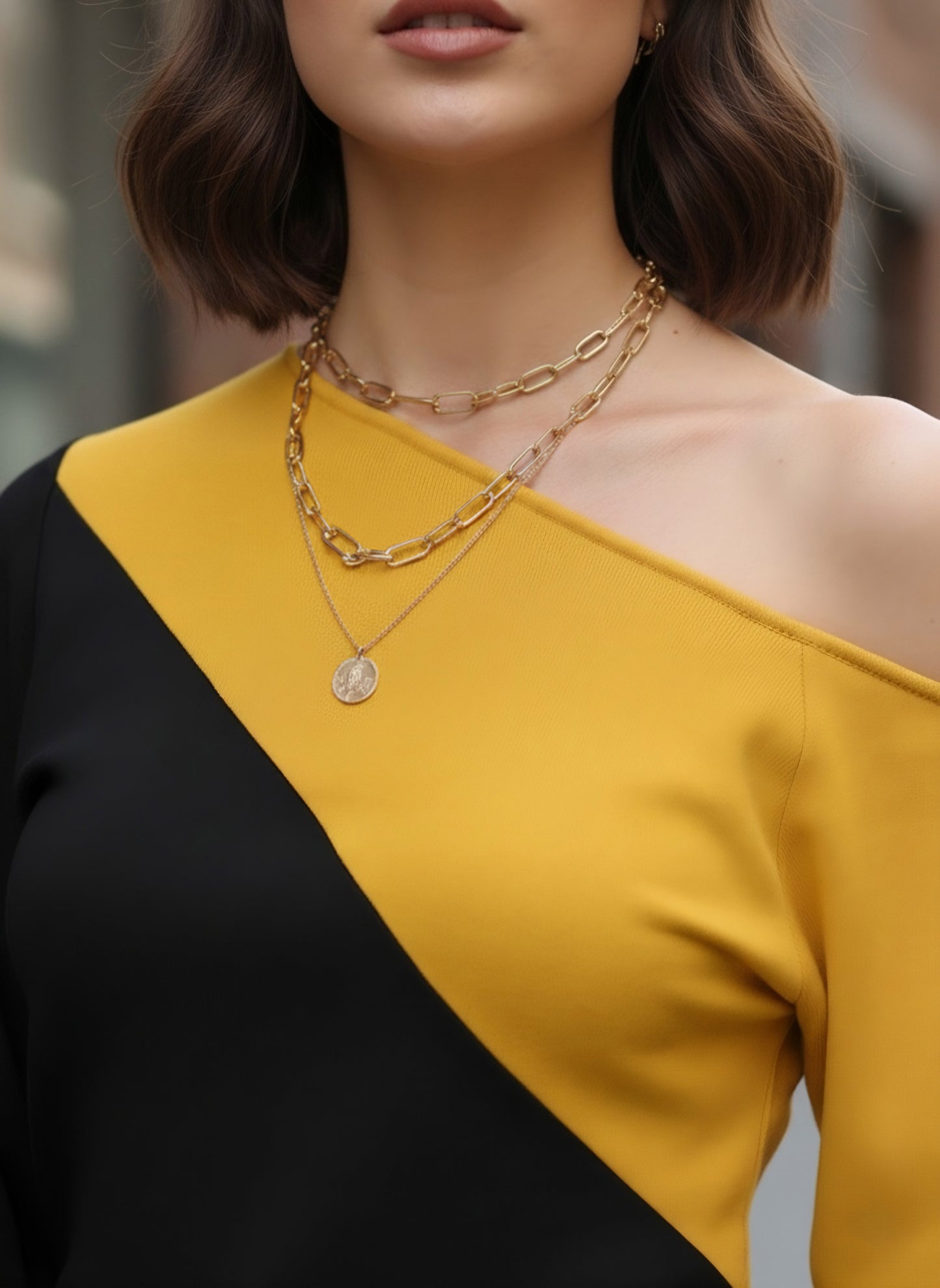 Berrylush Women Black & Mustard Yellow Colour-Blocked Pattern Round Neck Bishop Sleeves Regular Blouson Top