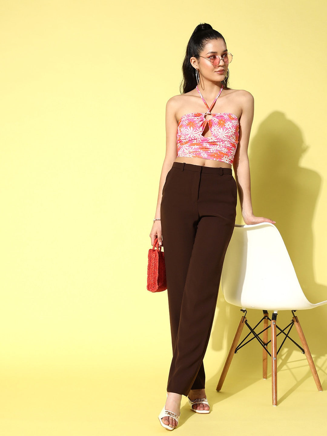 Berrylush Women Pink & White Floral Printed Halter Neck Tie-Up Cutout Jersey Backless Cropped Top