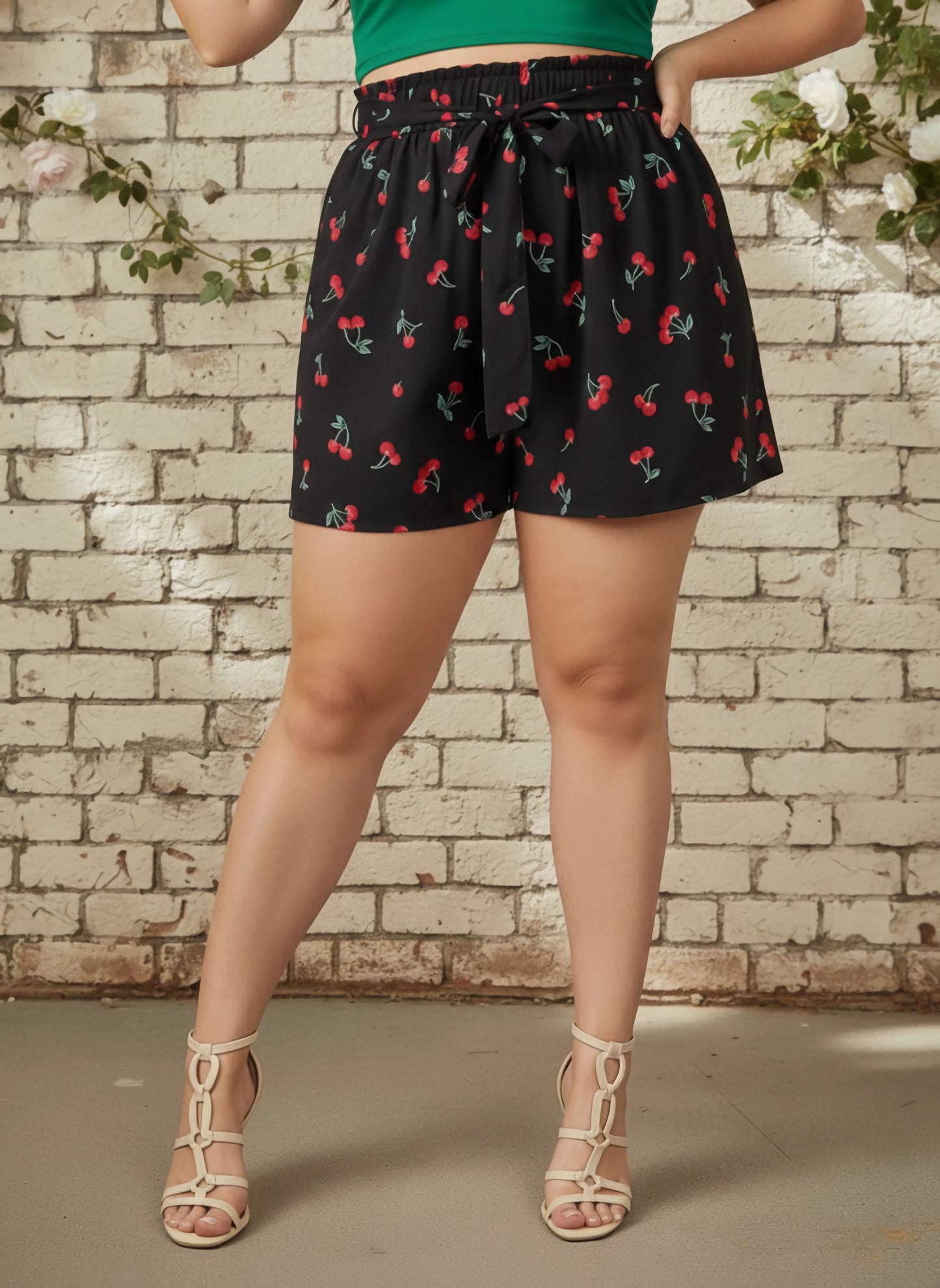 Berrylush Women Plus Size Black & Red Cherry Printed Front Tie-Up High-Rise Paperbag Waist Crepe Pleated Mini Shorts