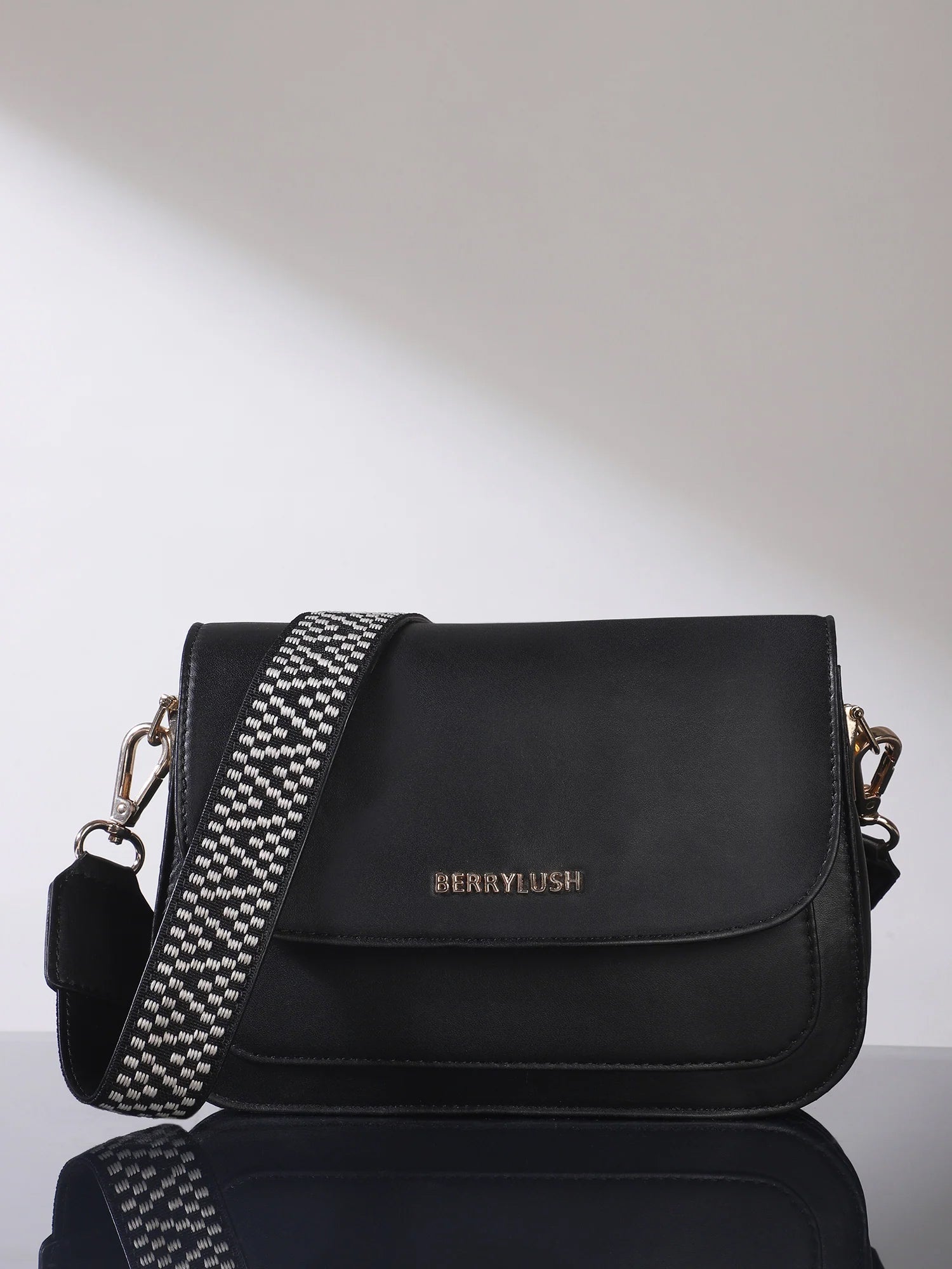 Stylish black women's sling bag by Berrylush with sleek design