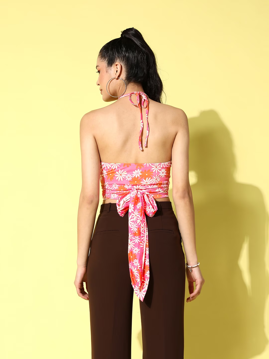 Berrylush Women Pink & White Floral Printed Halter Neck Tie-Up Cutout Jersey Backless Cropped Top