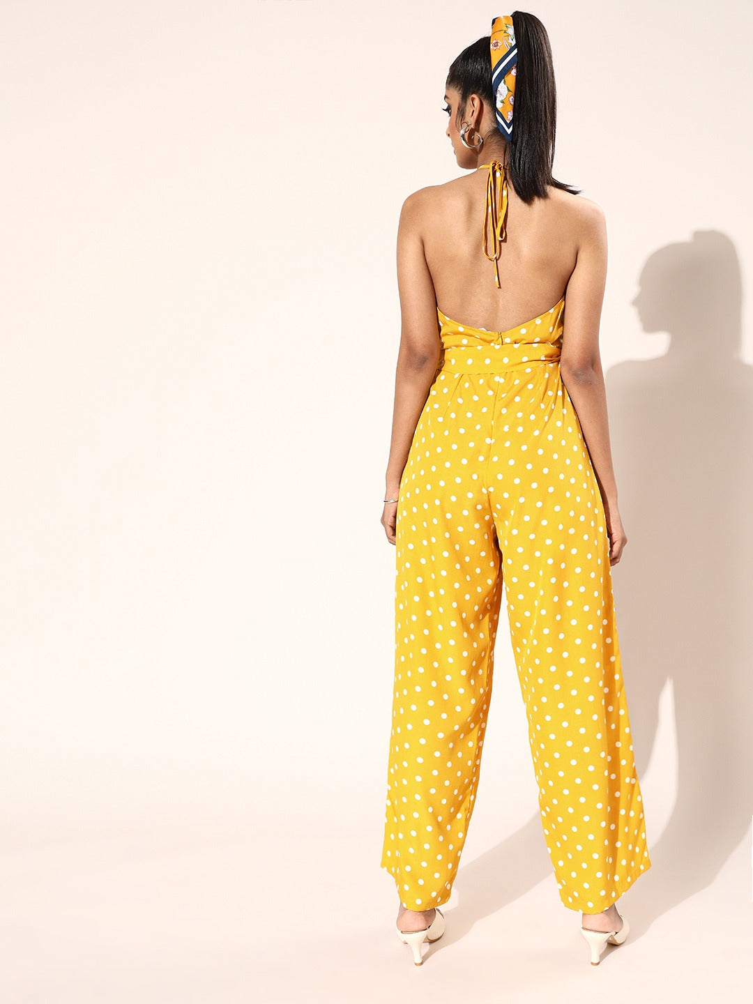 Berrylush Women Yellow & White Polka Dot Printed Halter Neck Backless Belted Jumpsuit