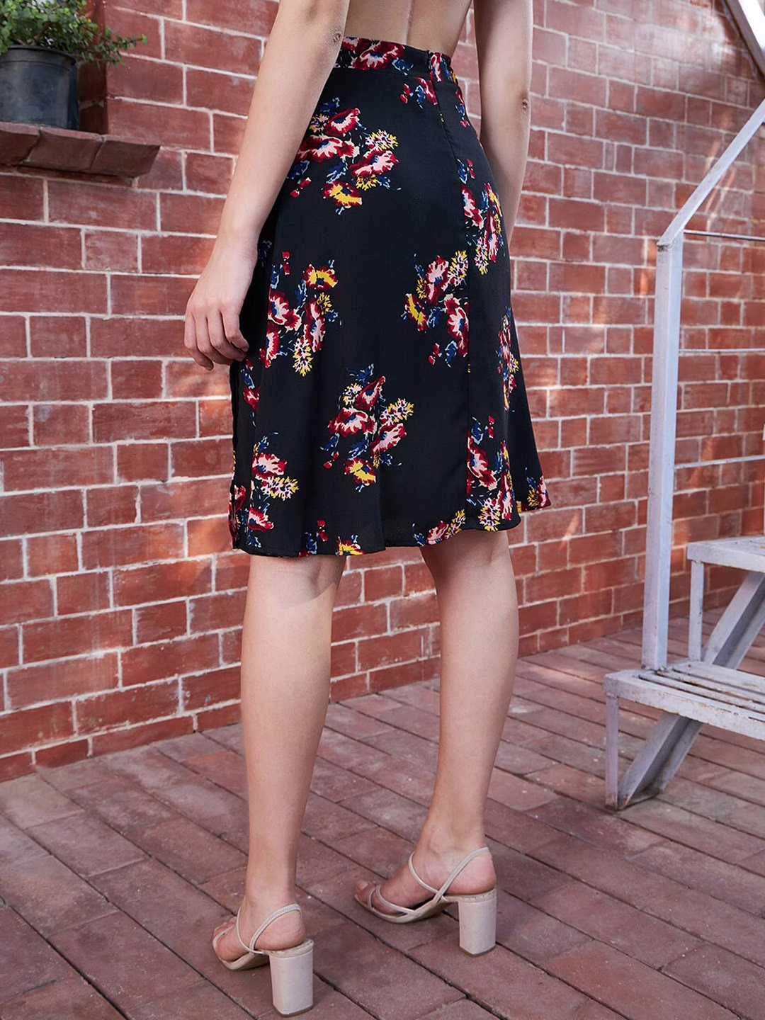 Berrylush Women Black Floral Printed High Rise Waist Thigh High Slit Flared A Line Midi Skirt