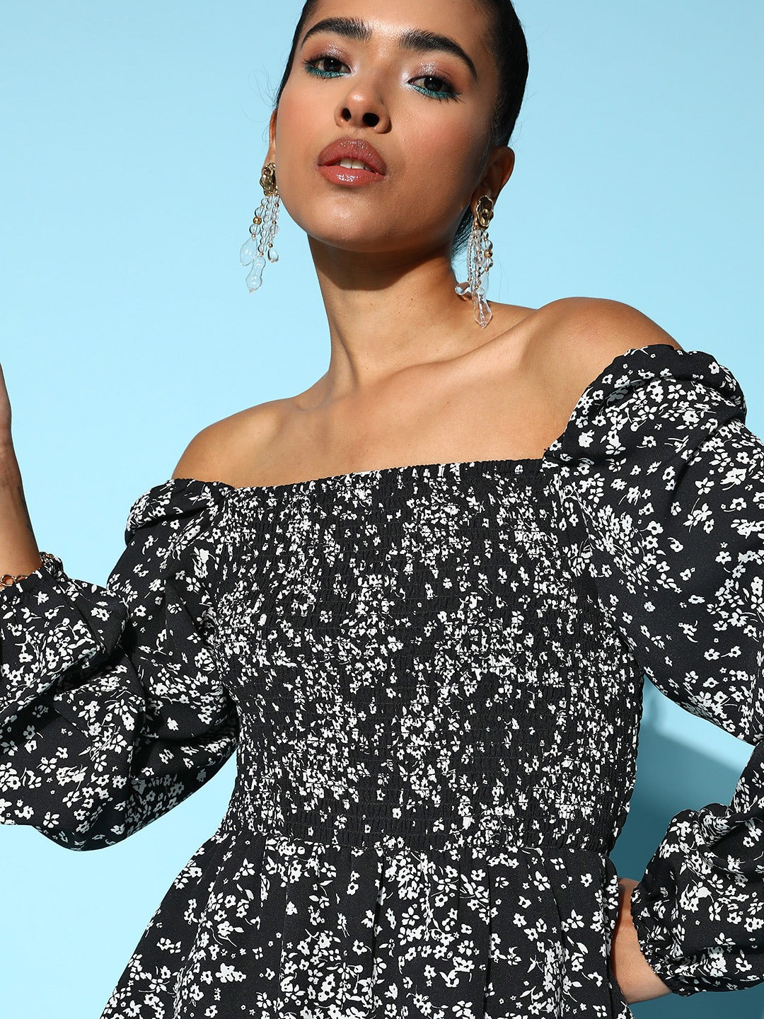 Berrylush Women Black & White Floral Printed Off-Shoulder Neck Cuff Sleeves Layered Mini Jumpsuit